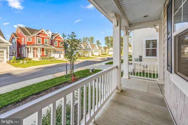 balcony with a porch and a residential view