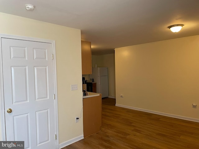 interior space with hardwood / wood-style flooring