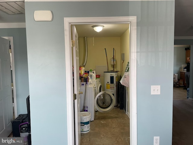 washroom featuring independent washer and dryer and electric water heater