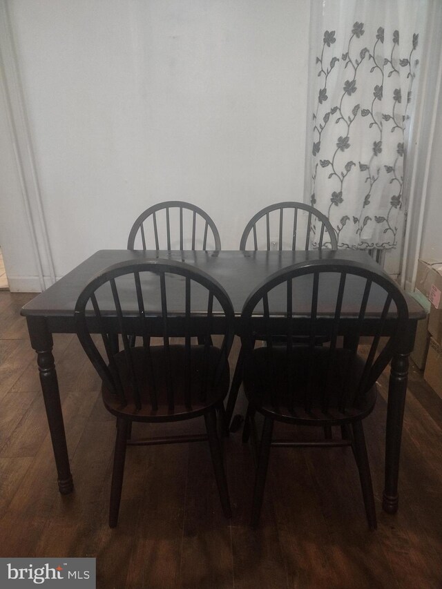 dining room featuring dark hardwood / wood-style floors