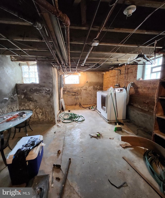 basement featuring washing machine and dryer