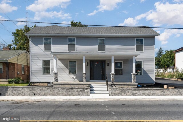 view of front of home featuring covered porch