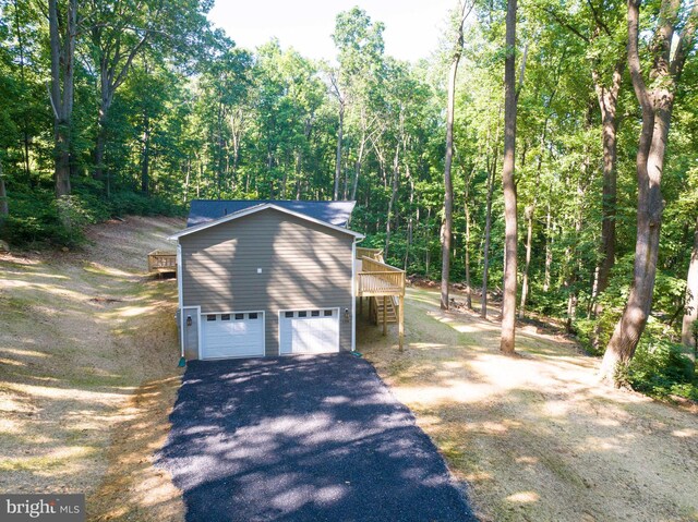 exterior space featuring a garage