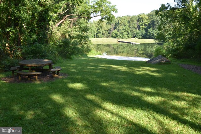 view of yard with a water view