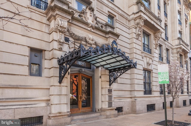 property entrance featuring french doors