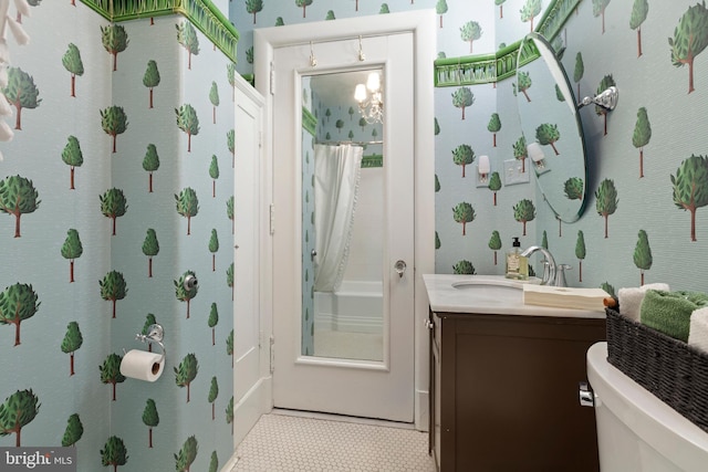 full bathroom featuring vanity, toilet, shower / bath combo, and tile patterned flooring