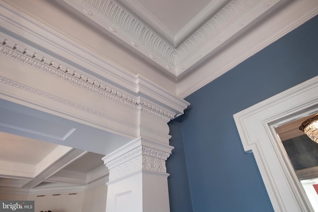 interior details with ornamental molding, beam ceiling, and coffered ceiling