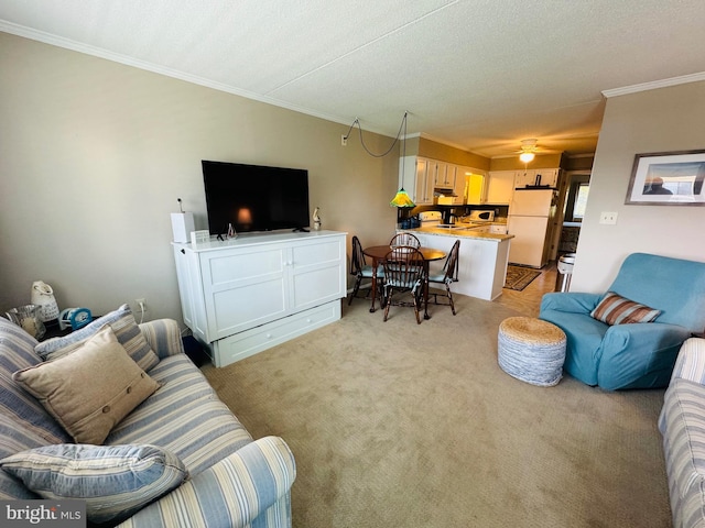 living room featuring crown molding, a ceiling fan, and light colored carpet