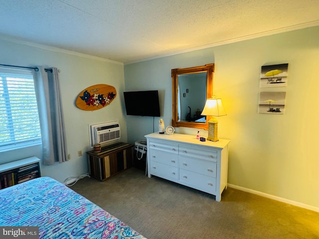 bedroom featuring a textured ceiling, baseboards, ornamental molding, a wall mounted AC, and dark colored carpet