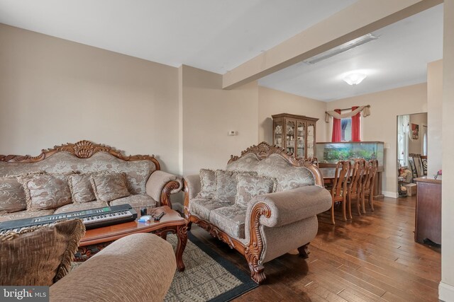 living room with hardwood / wood-style flooring