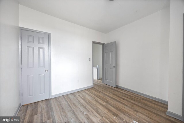 interior space with hardwood / wood-style floors