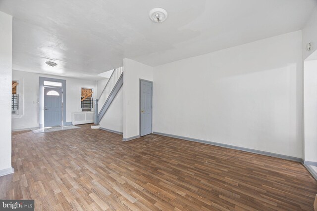 interior space with hardwood / wood-style floors