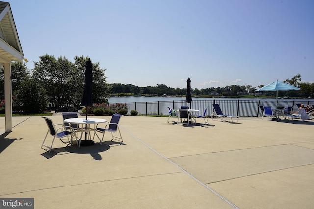 view of patio / terrace with a water view