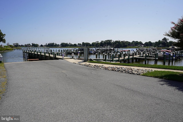 dock area featuring a water view