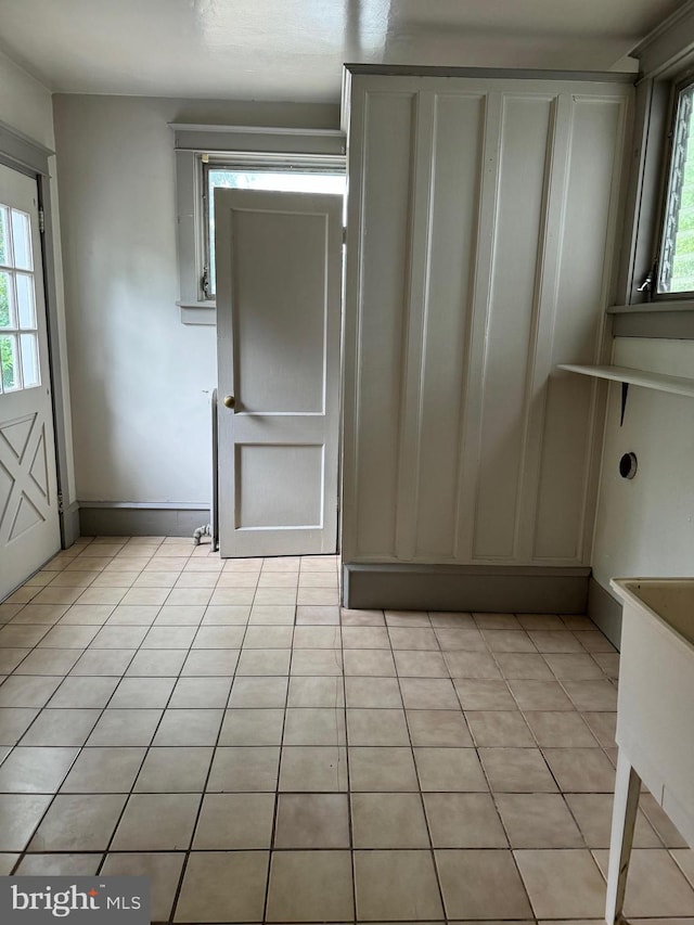 interior space featuring light tile patterned floors