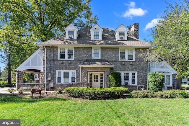 view of front of home with a front yard