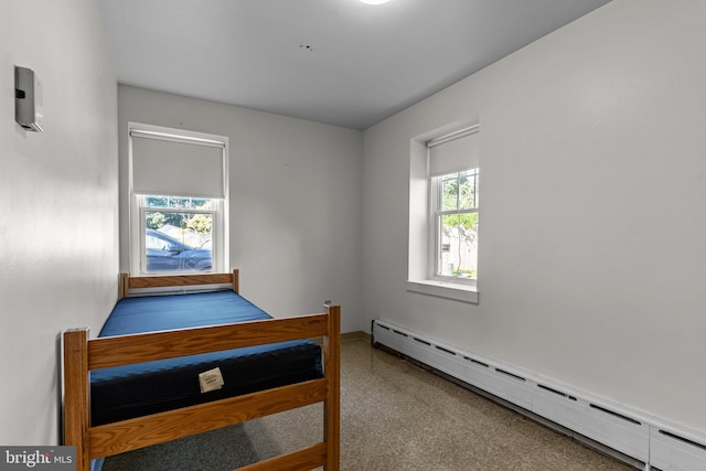 bedroom featuring baseboard heating