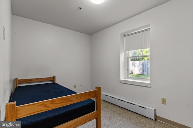 bedroom with a baseboard radiator