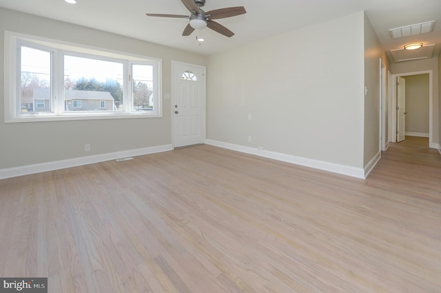 interior space with light hardwood / wood-style flooring and ceiling fan