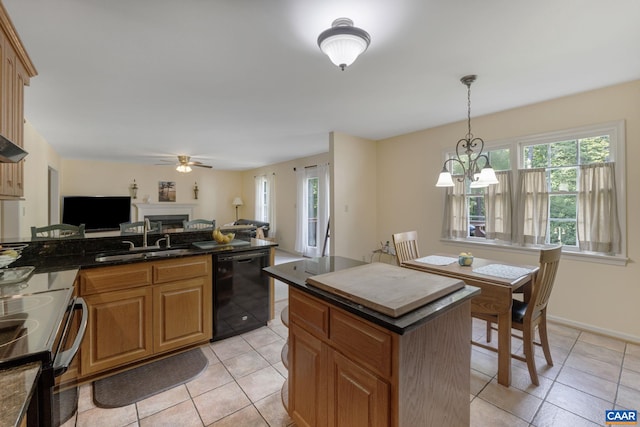 kitchen featuring ceiling fan with notable chandelier, black dishwasher, pendant lighting, stainless steel electric range oven, and sink