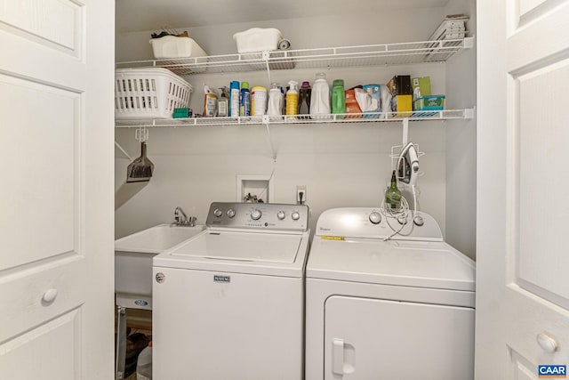 laundry area featuring washer and clothes dryer