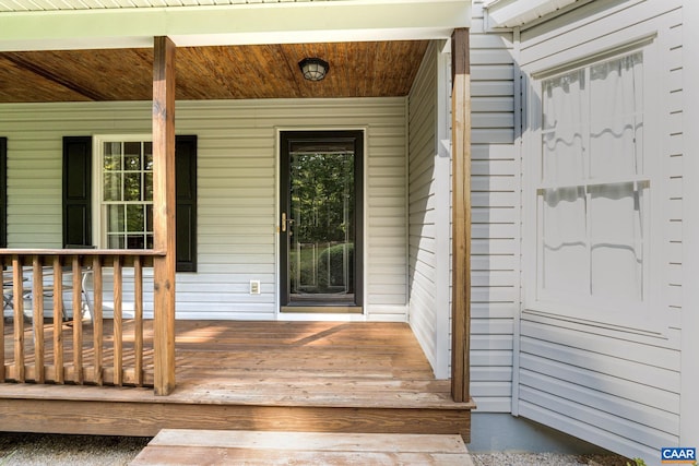 doorway to property featuring a porch