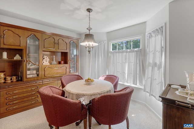 dining room featuring an inviting chandelier