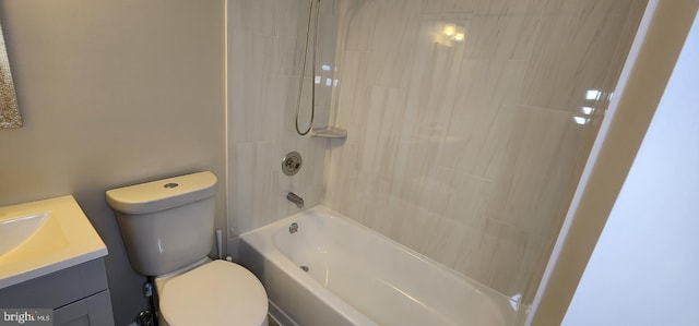 full bathroom featuring vanity, toilet, and tiled shower / bath combo