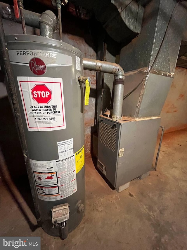 utility room with water heater