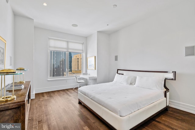 bedroom featuring dark hardwood / wood-style floors