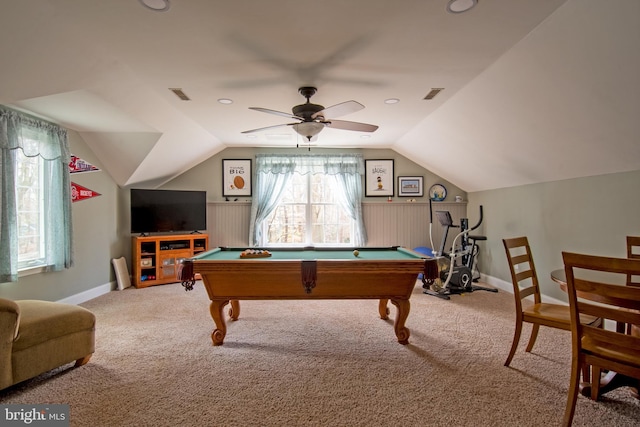 playroom featuring visible vents, carpet flooring, a ceiling fan, and vaulted ceiling