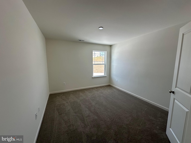 view of carpeted spare room