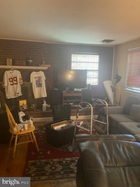 living room with hardwood / wood-style floors