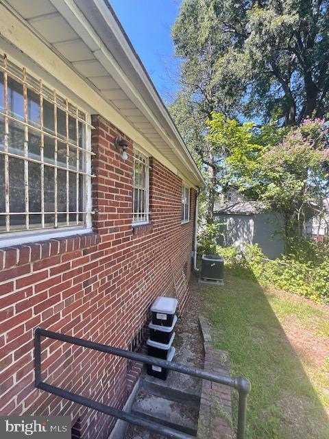 view of property exterior featuring central air condition unit