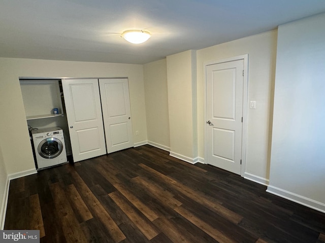 interior space with washer / dryer and dark hardwood / wood-style floors