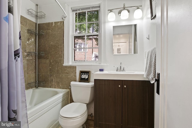 full bathroom featuring shower / bathtub combination with curtain, toilet, and vanity