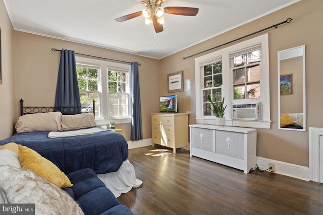 bedroom featuring cooling unit, crown molding, dark hardwood / wood-style flooring, ceiling fan, and radiator