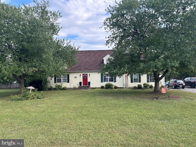 view of front of property with a front lawn