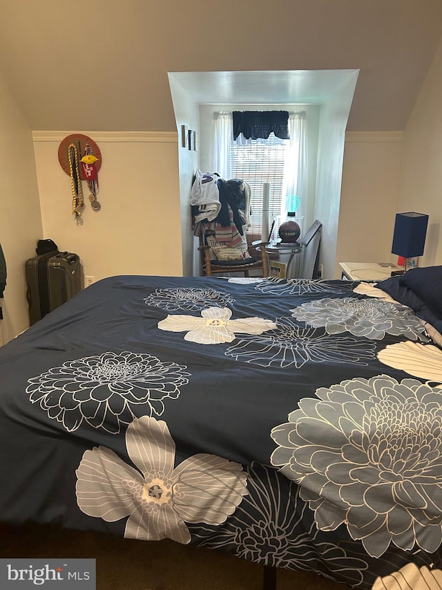 bedroom featuring ornamental molding