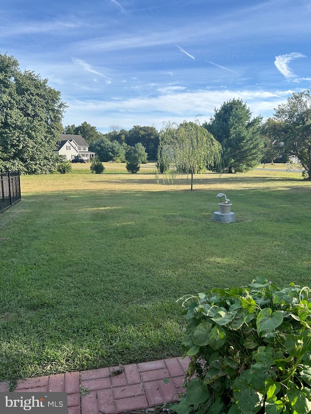 view of yard with fence