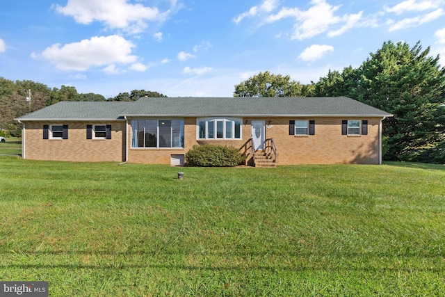 single story home with a front yard