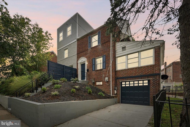 view of front of property featuring a garage