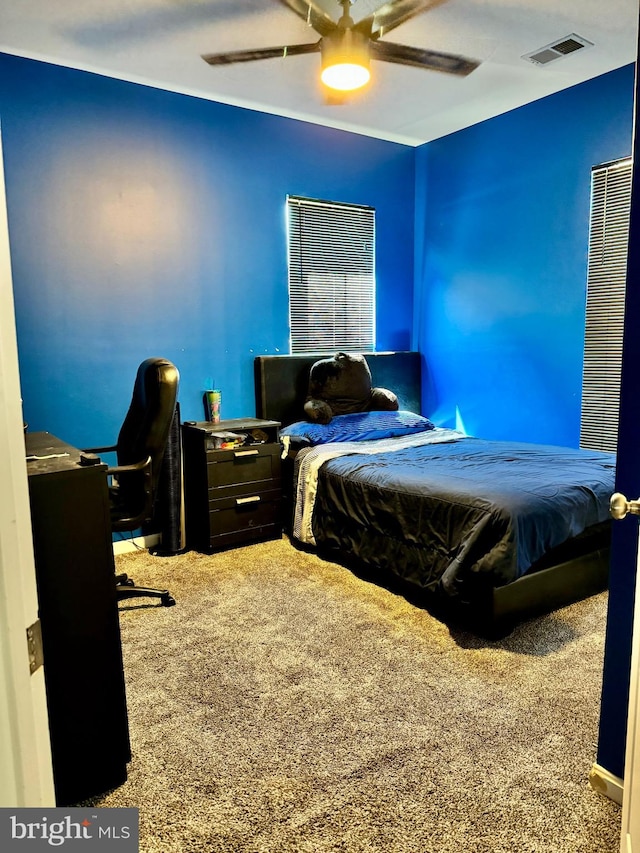 bedroom featuring carpet and ceiling fan