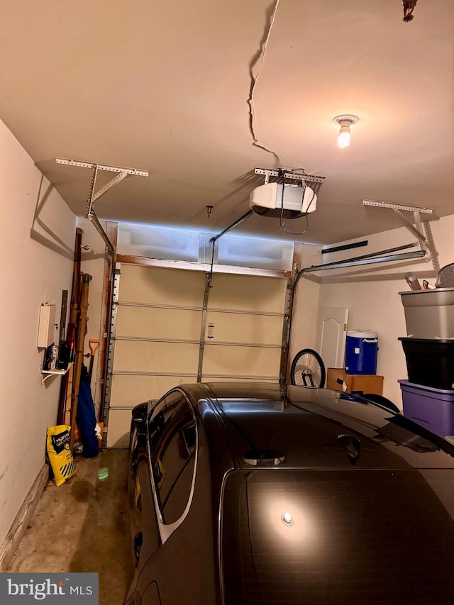 garage featuring a garage door opener