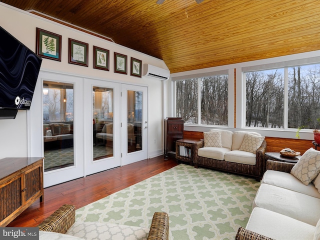 sunroom / solarium featuring wood ceiling, a wall mounted air conditioner, and vaulted ceiling