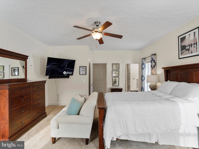 bedroom with light carpet and ceiling fan