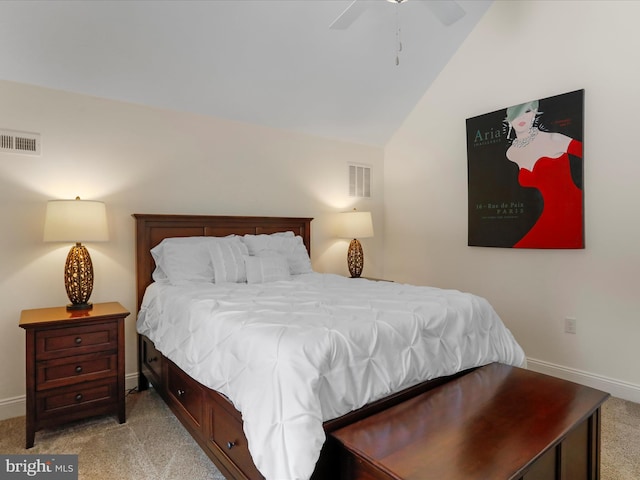 bedroom with lofted ceiling, light carpet, and ceiling fan