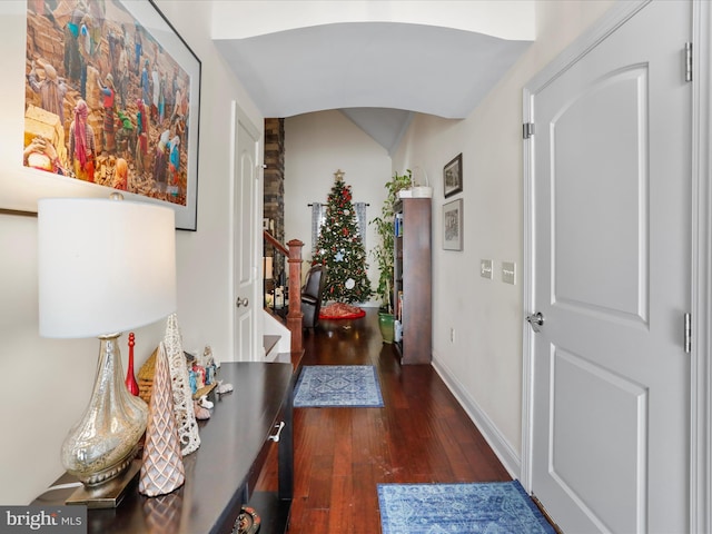 hall with dark hardwood / wood-style flooring