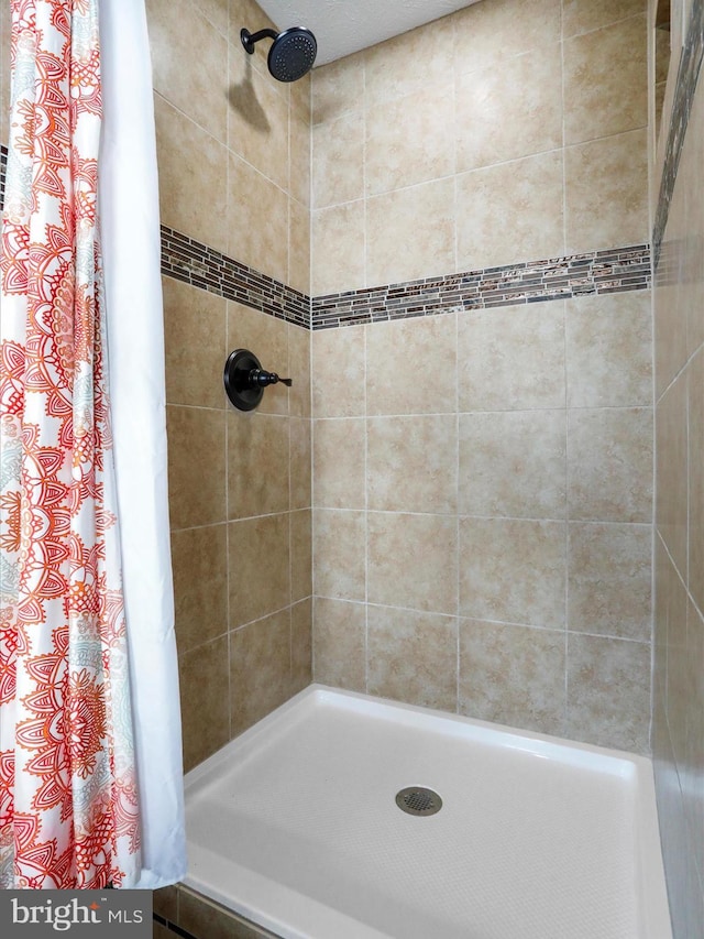 bathroom with walk in shower