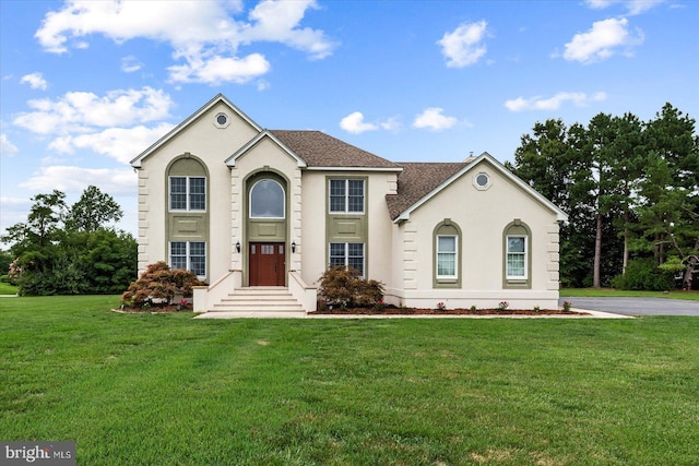 view of front of home featuring a front lawn